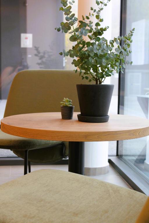 Istumisnurk majutusasutuses BEE GREEN Linz Self-Check-in-Hotel