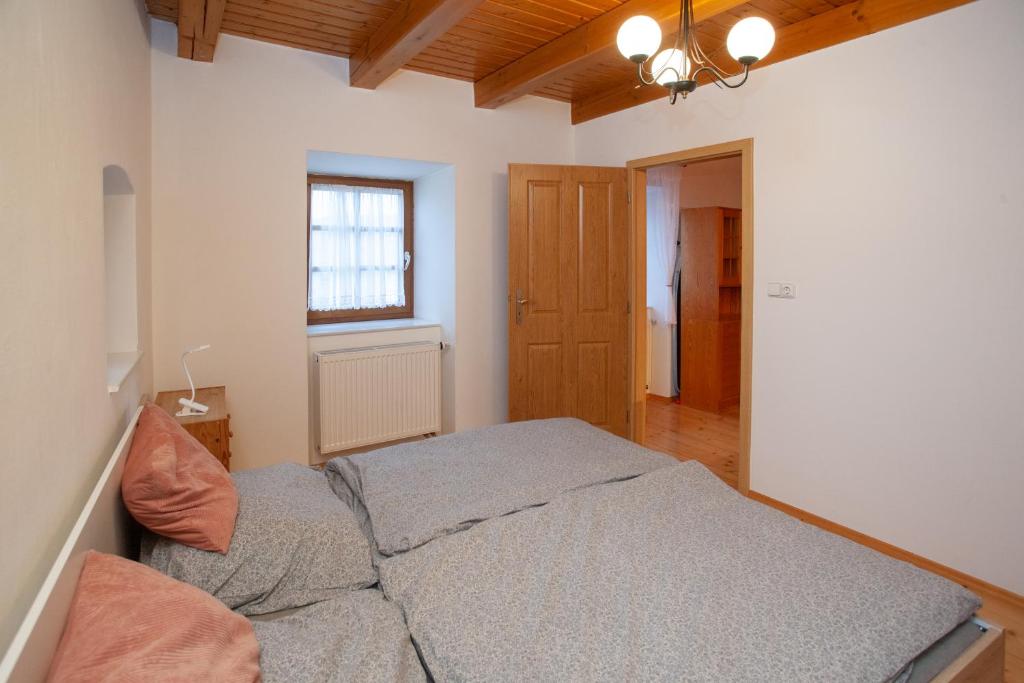 Postel nebo postele na pokoji v ubytování Apartmány NaVyhlídce