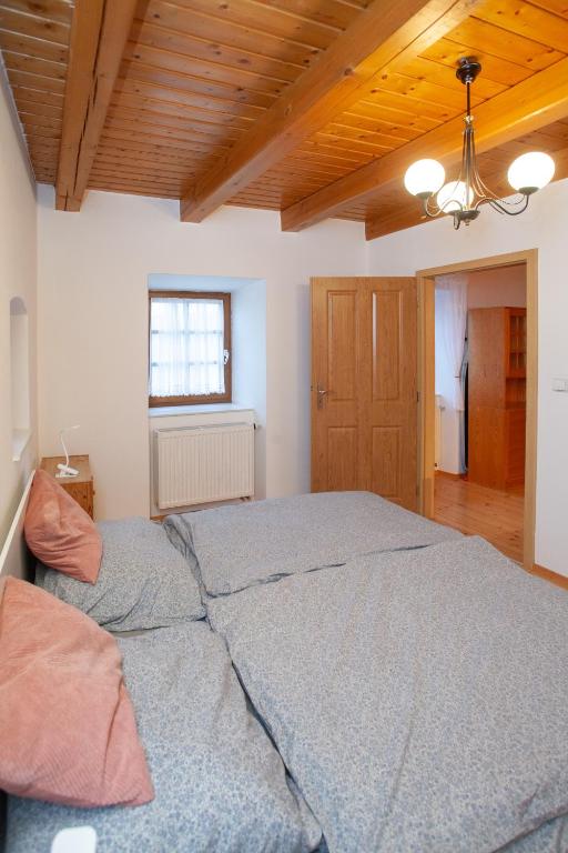 Postel nebo postele na pokoji v ubytování Apartmány NaVyhlídce