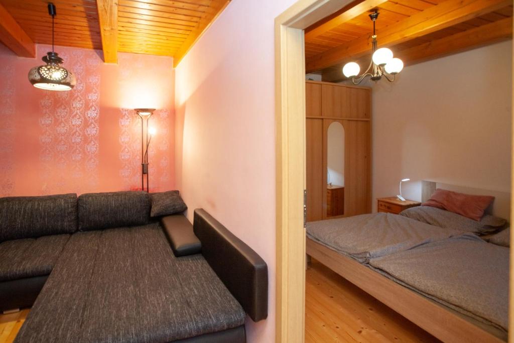 Postel nebo postele na pokoji v ubytování Apartmány NaVyhlídce