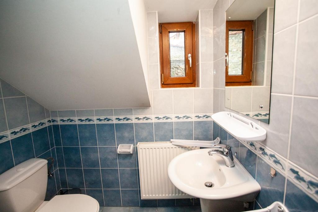 Koupelna v ubytování Apartmány NaVyhlídce