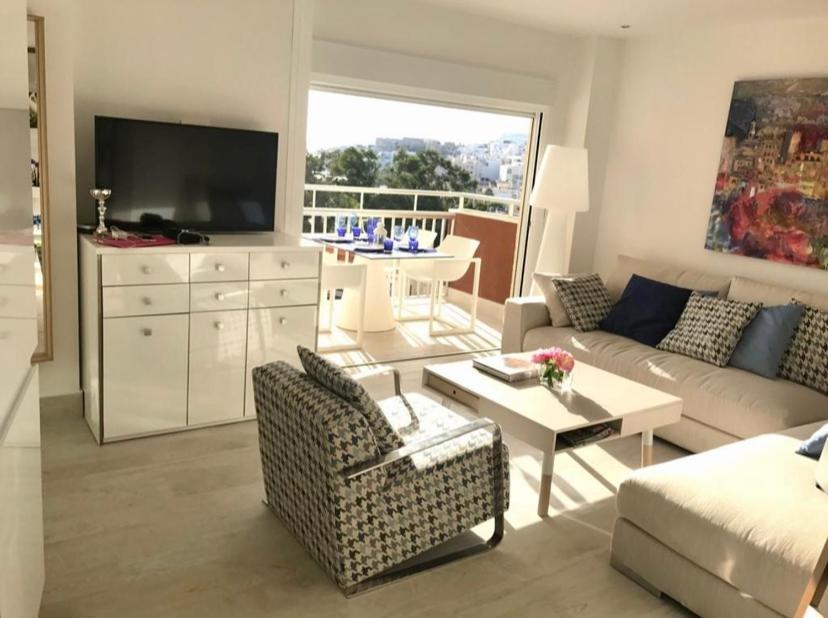 Televízia a/alebo spoločenská miestnosť v ubytovaní Las Góndolas Luxe
