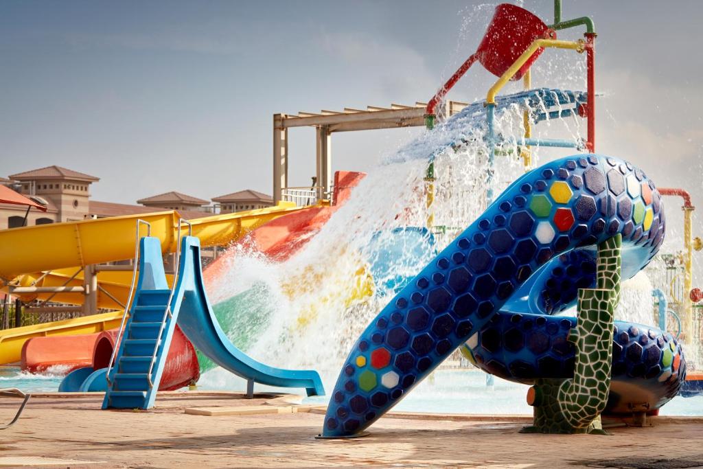 The swimming pool at or close to Coral Sea Beach and Aqua Park