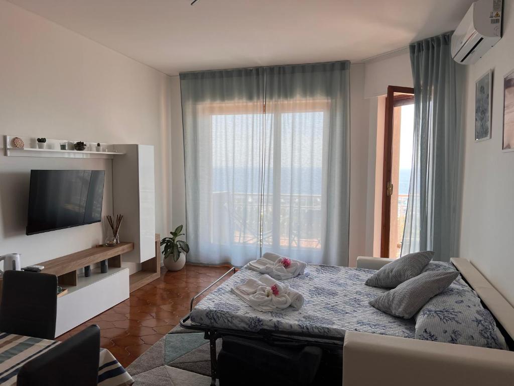 Telewizja i/lub zestaw kina domowego w obiekcie Special Home VISTA MARE e Parcheggio privato