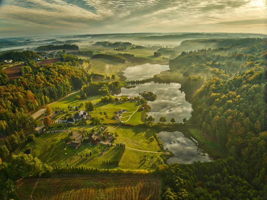 an aerial view of a valley with a river at Wodny Świat in Ostrzyce