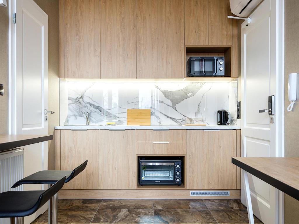 Kuchyňa alebo kuchynka v ubytovaní Tyzenhauz Apartments Comfort