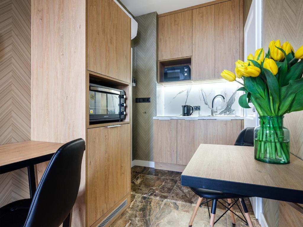 Kuchyňa alebo kuchynka v ubytovaní Tyzenhauz Apartments Comfort