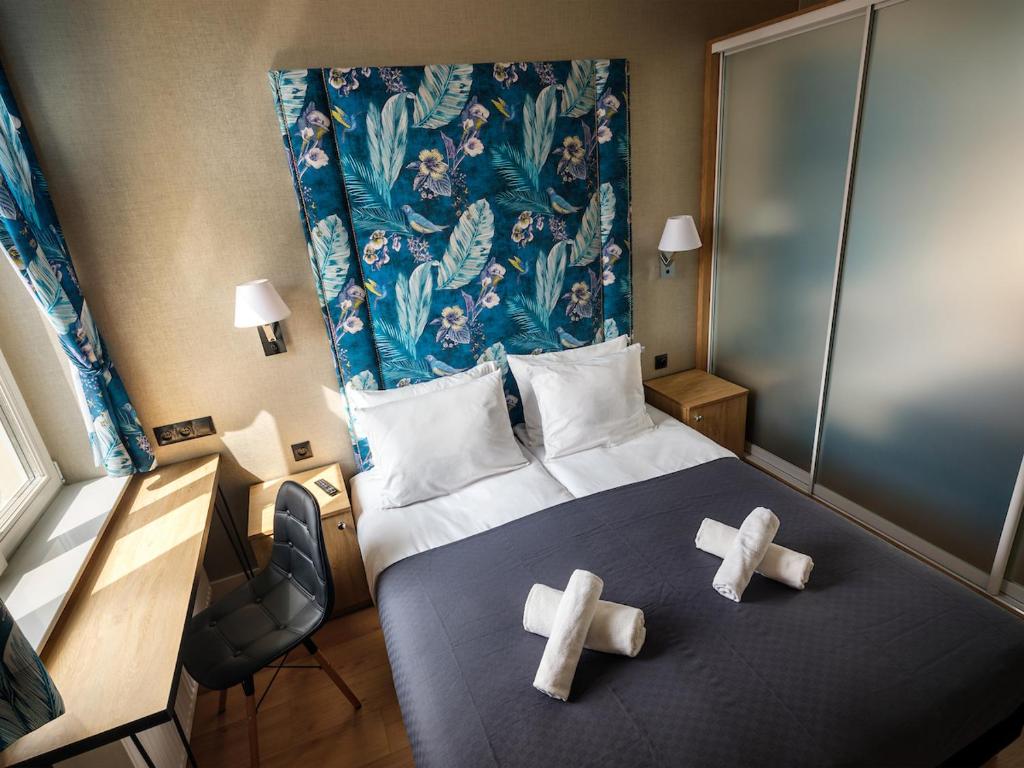 Posteľ alebo postele v izbe v ubytovaní Tyzenhauz Apartments Comfort
