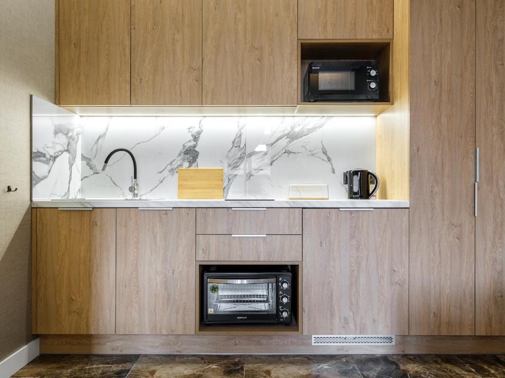 Kuchyňa alebo kuchynka v ubytovaní Tyzenhauz Apartments Comfort