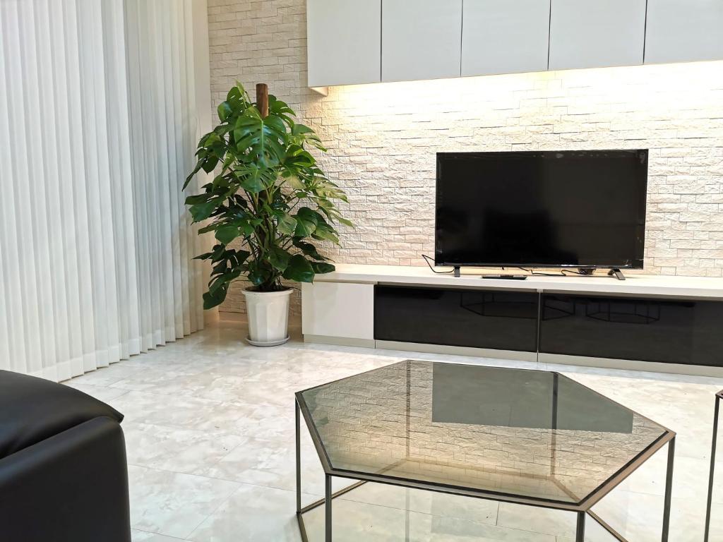 TV a/nebo společenská místnost v ubytování Bell house