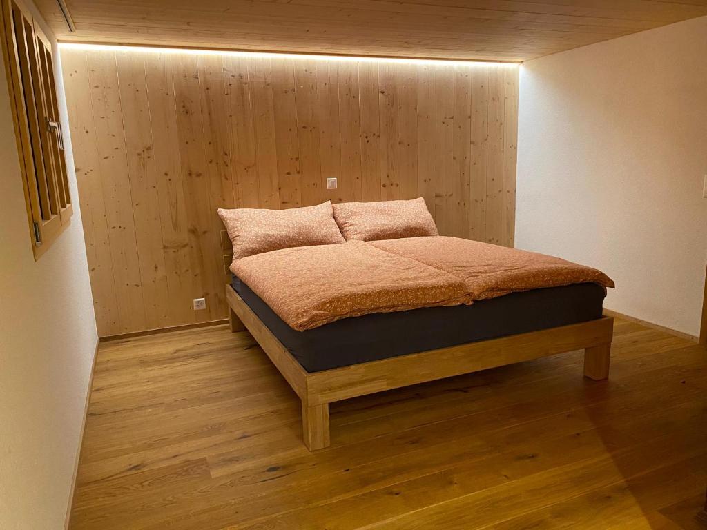 Postel nebo postele na pokoji v ubytování Chalet Brünig