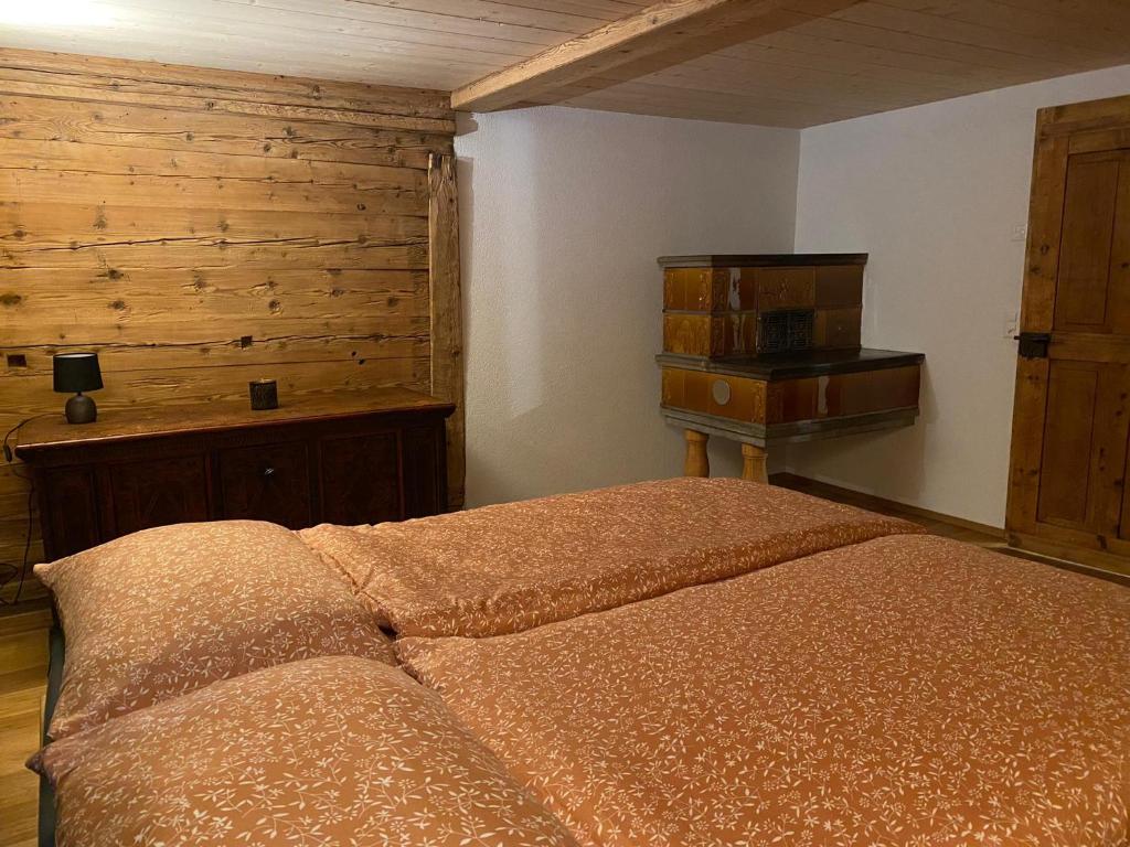Postel nebo postele na pokoji v ubytování Chalet Brünig
