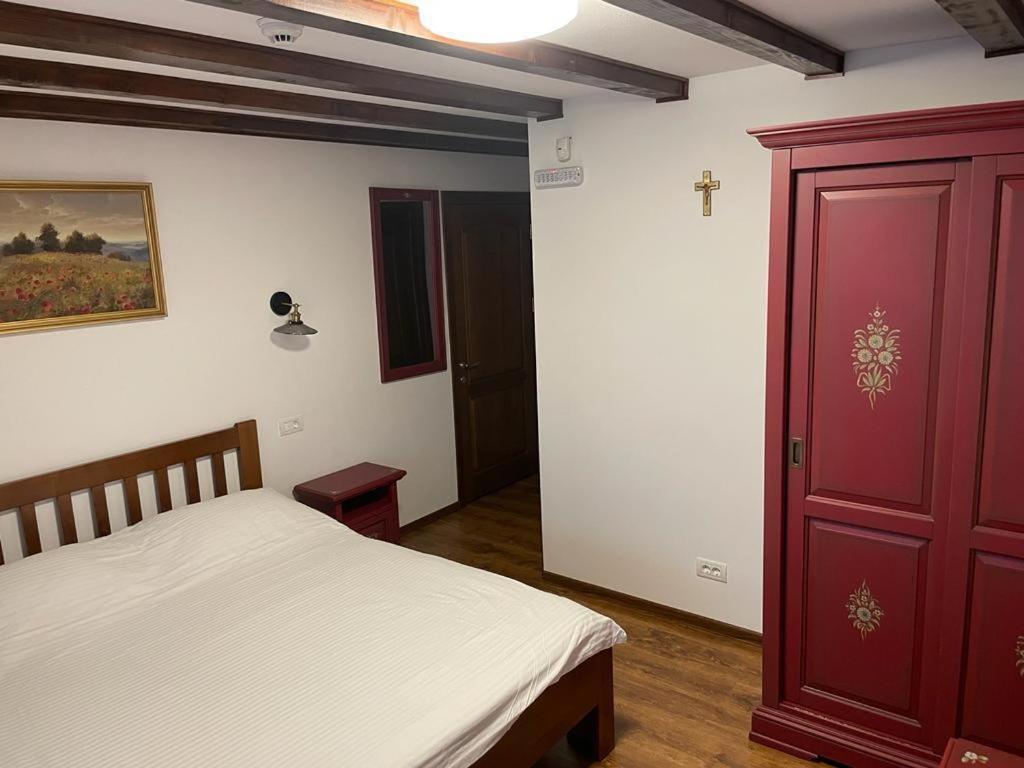 Postel nebo postele na pokoji v ubytování Dorul Pescarului