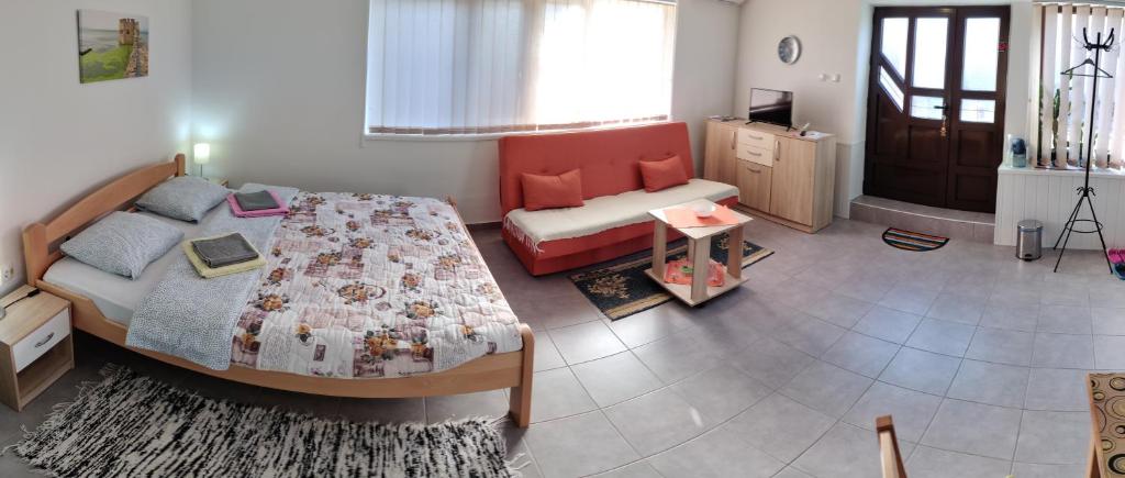 Postel nebo postele na pokoji v ubytování Apartman Ankica