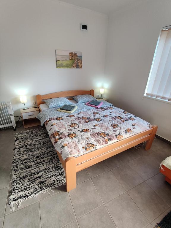 Postel nebo postele na pokoji v ubytování Apartman Ankica