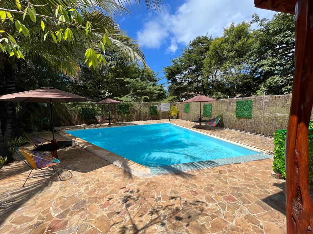 Bazén v ubytování Casa Tropical Playa Grande nebo v jeho okolí