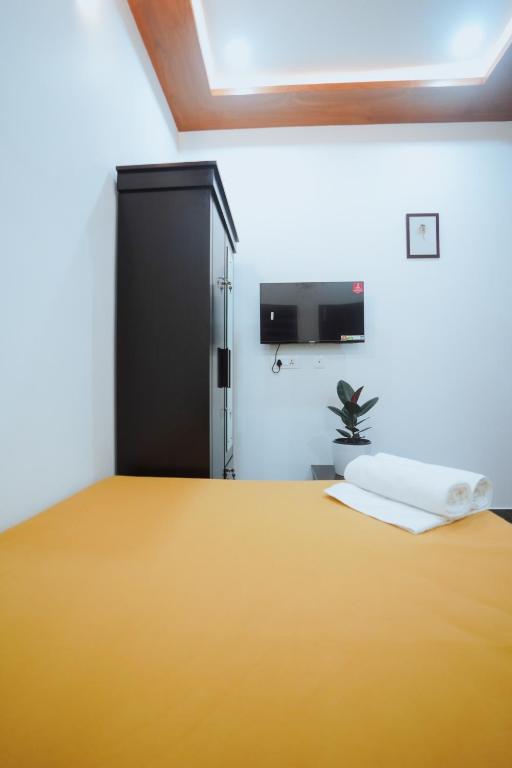 Postel nebo postele na pokoji v ubytování BEVERLY SUITES