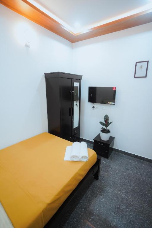 Postel nebo postele na pokoji v ubytování BEVERLY SUITES