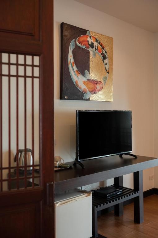 TV a/nebo společenská místnost v ubytování Ban Saithong Beach Resort