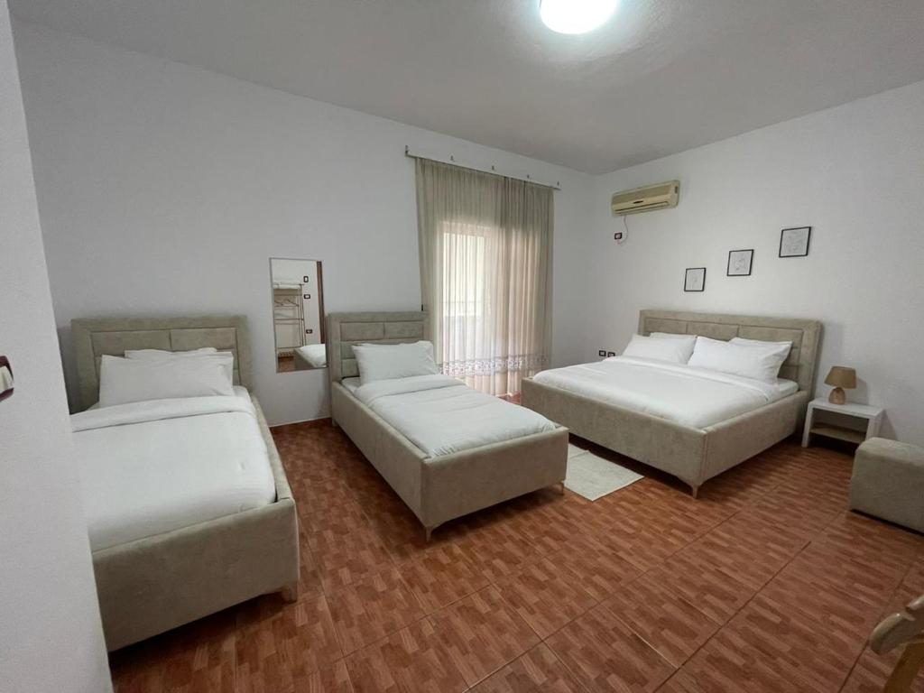 Letto o letti in una camera di Villa Oasis