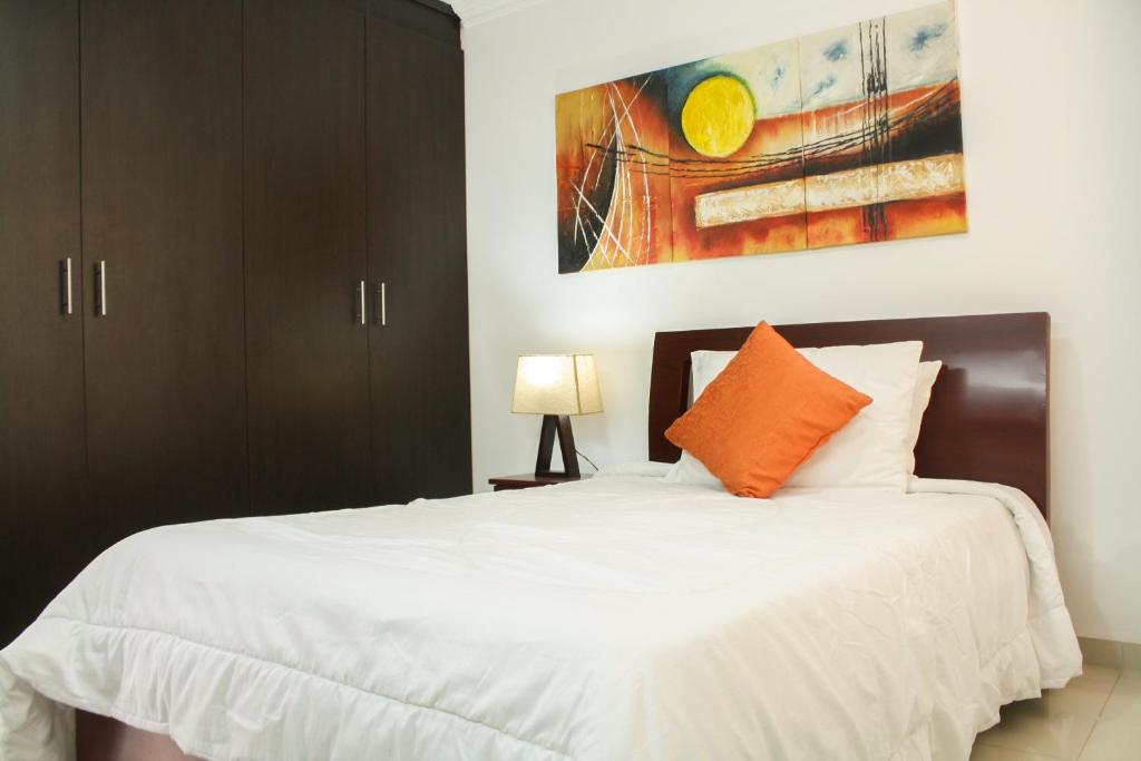 Postel nebo postele na pokoji v ubytování Apartahotel Kelly