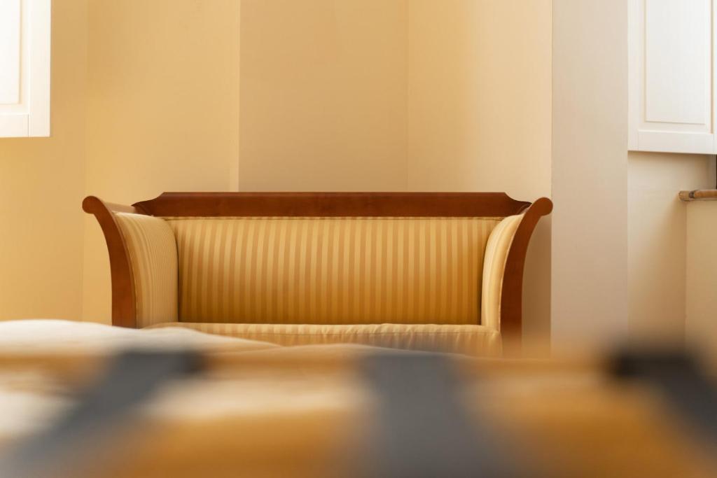 Postel nebo postele na pokoji v ubytování Hotel Ristorante Vecchia Vibo