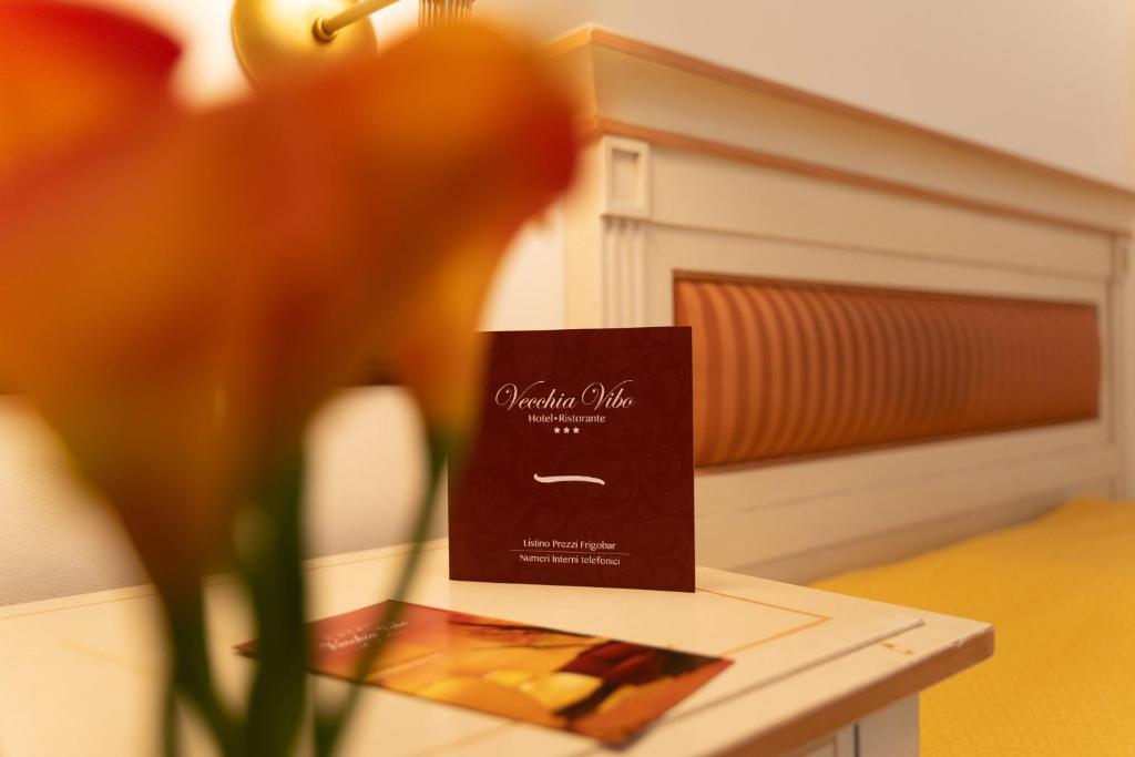 Postel nebo postele na pokoji v ubytování Hotel Ristorante Vecchia Vibo
