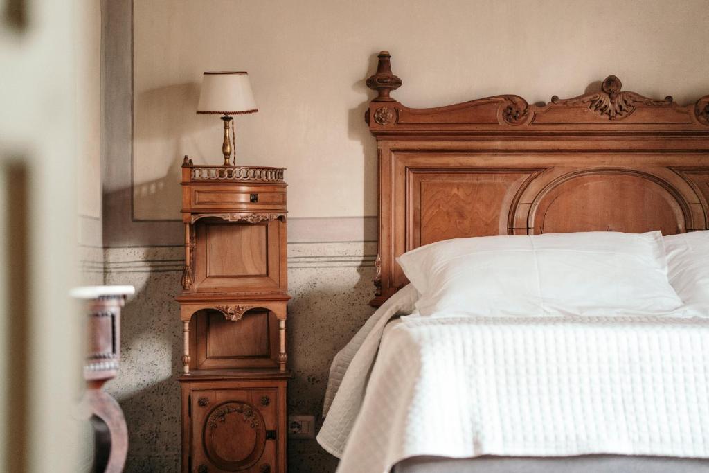 Een bed of bedden in een kamer bij Puleera Boutique Hotel