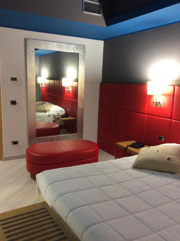 Postel nebo postele na pokoji v ubytování Hotel Motel Futura