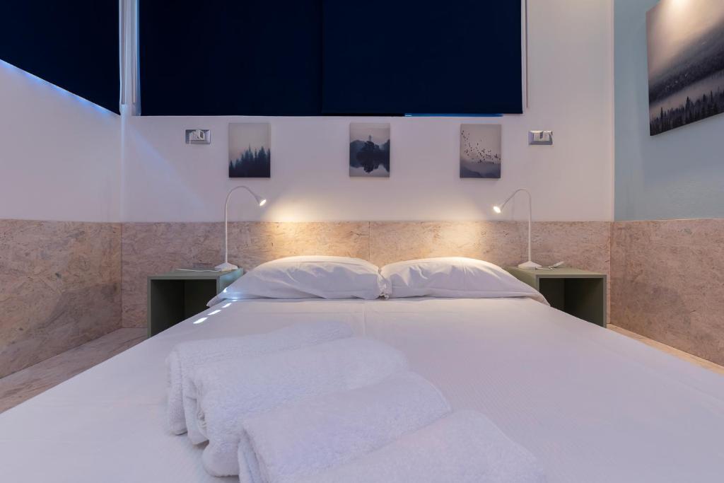Łóżko lub łóżka w pokoju w obiekcie [Sweet apartment] - Grazioli 2