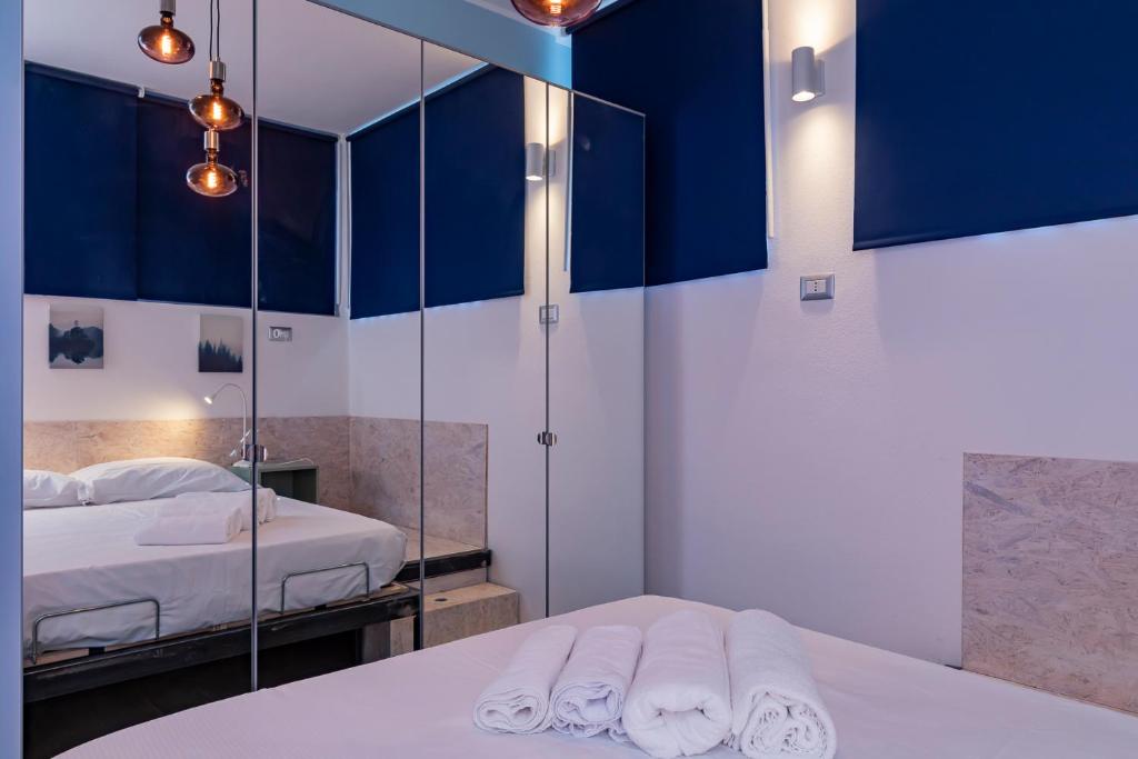 Łóżko lub łóżka w pokoju w obiekcie [Sweet apartment] - Grazioli 2