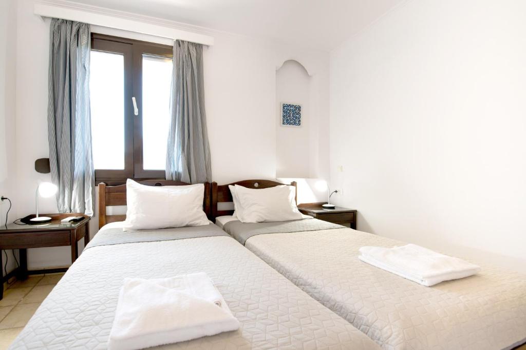 Posteľ alebo postele v izbe v ubytovaní Captain's Beach Apartments