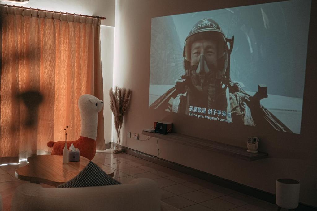TV a/nebo společenská místnost v ubytování Gee homestay