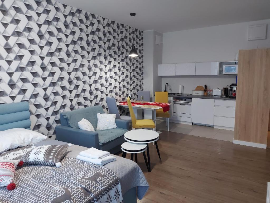 Kuchyň nebo kuchyňský kout v ubytování Apartament SenGA