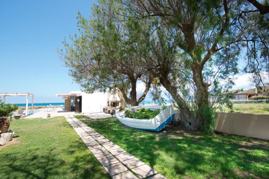 Vonkajšia záhrada v ubytovaní Captain's Beach Apartments