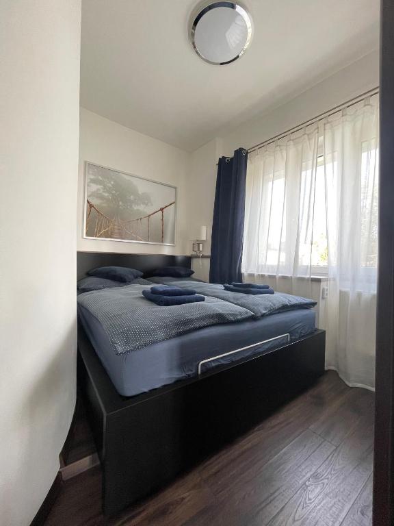 Łóżko lub łóżka w pokoju w obiekcie Stylové apartmánky