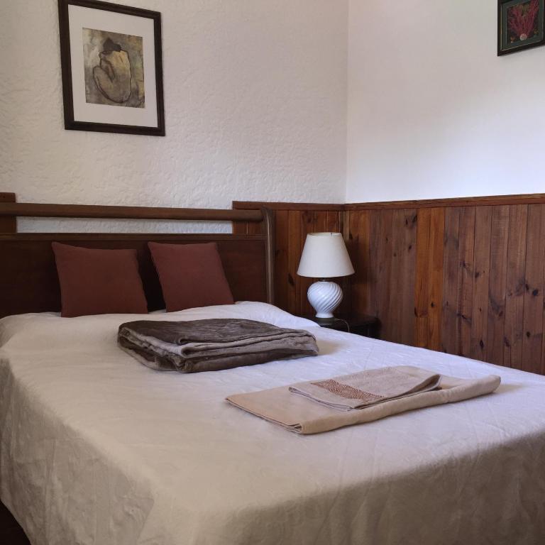 Postel nebo postele na pokoji v ubytování Palmeras del Verdun