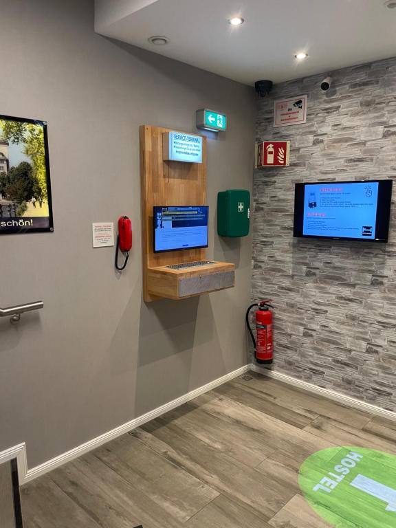 TV a/nebo společenská místnost v ubytování Hostel-Centrum