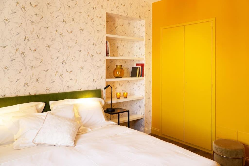 A bed or beds in a room at New Boutique Apartment