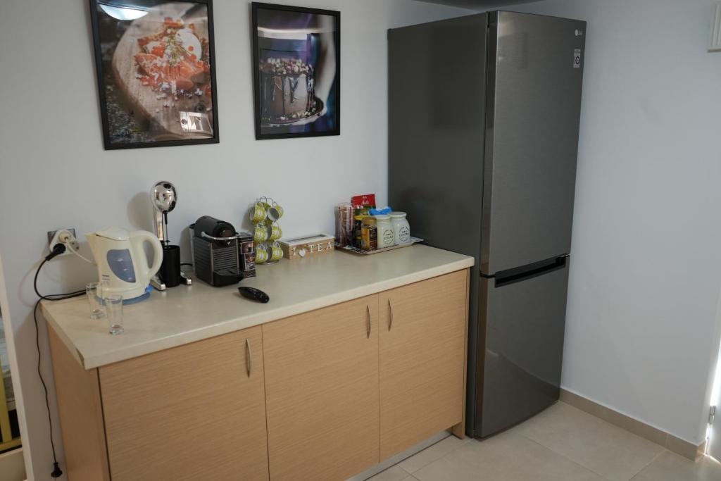 Zdjęcie z galerii obiektu Cozy apartment near sea and airport w mieście Artemida