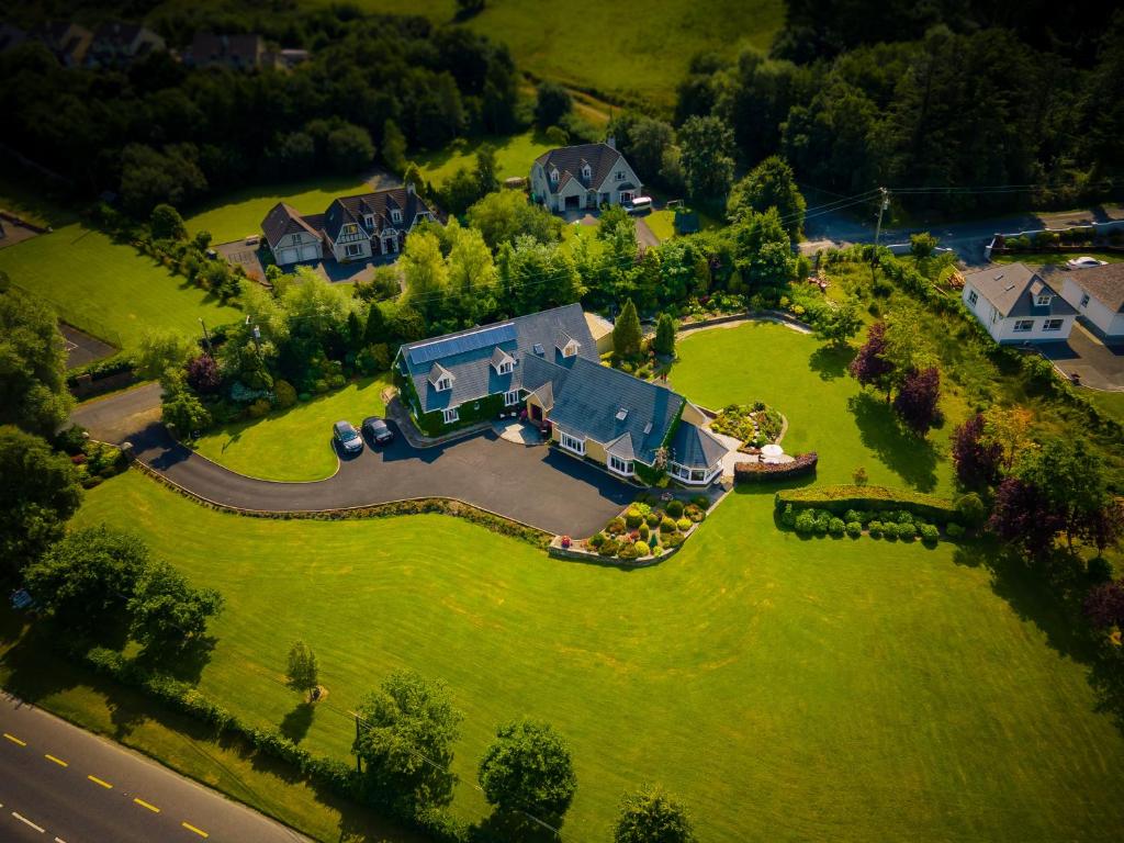 an overhead view of a house on a green lawn at Park Lodge Bed and Breakfast in Abbeyfeale