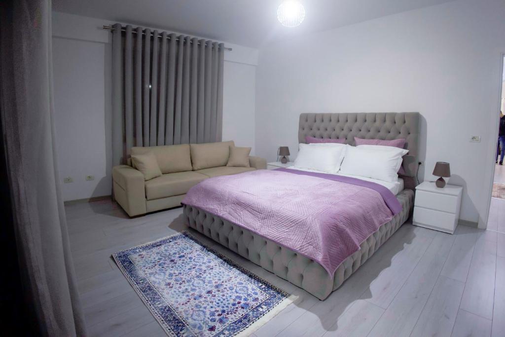 Postel nebo postele na pokoji v ubytování GRANDE APARTMENT KORCE