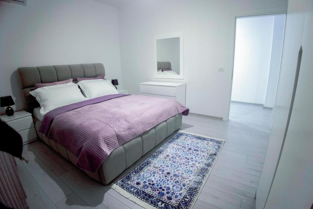 Postel nebo postele na pokoji v ubytování GRANDE APARTMENT KORCE
