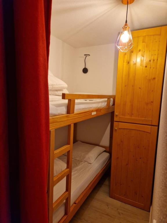 Postel nebo postele na pokoji v ubytování 2 pièce cabine Val Thorens