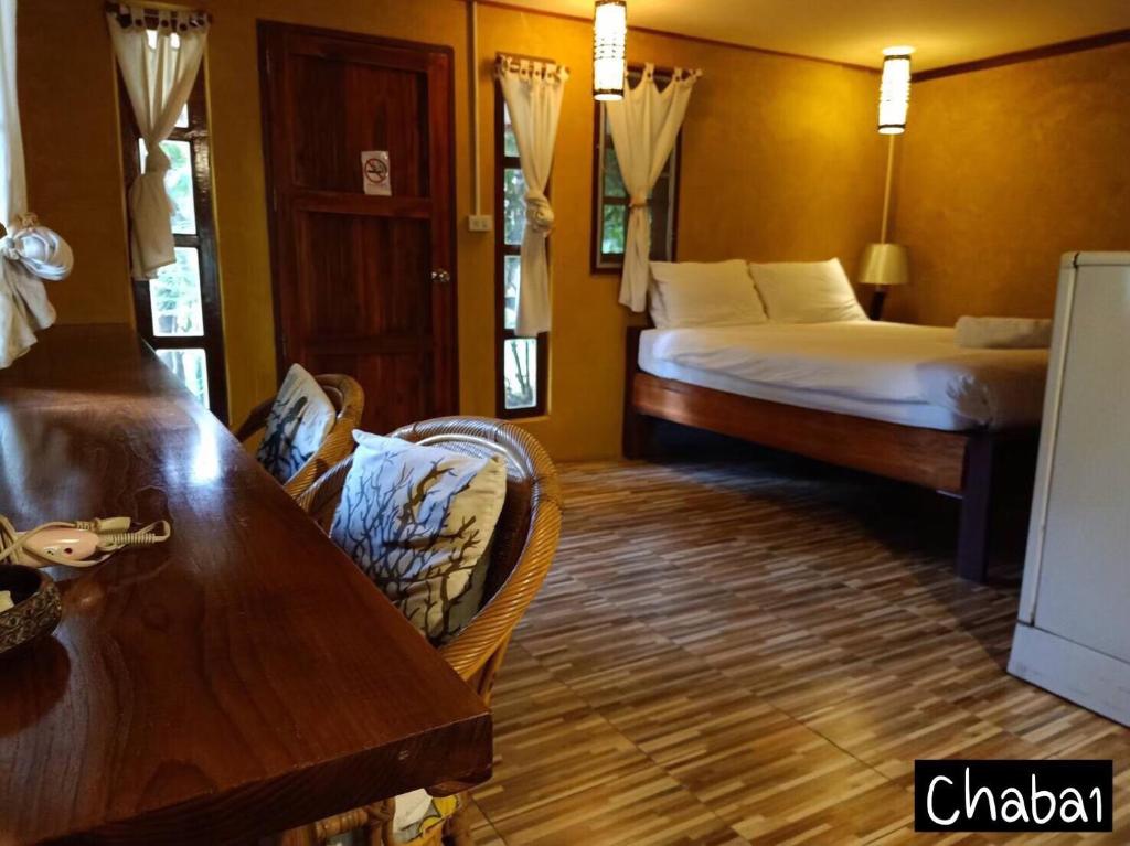 Postel nebo postele na pokoji v ubytování Aerie Lodge