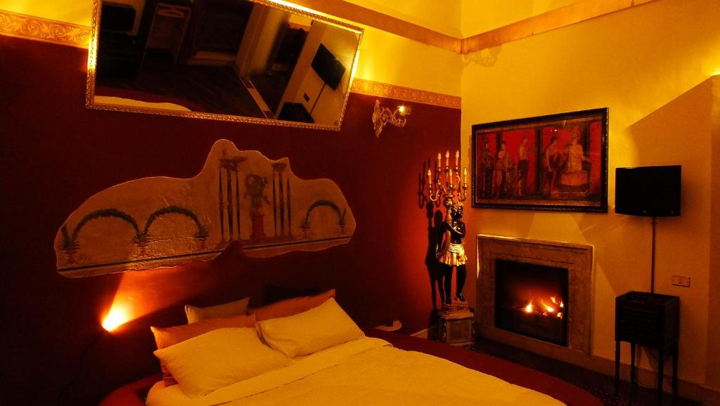 TV a/nebo společenská místnost v ubytování Residenze Gregoriane - Residenza d'Epoca