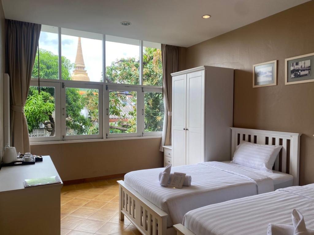 Feung Nakorn Balcony Rooms and Cafe - Resim 31