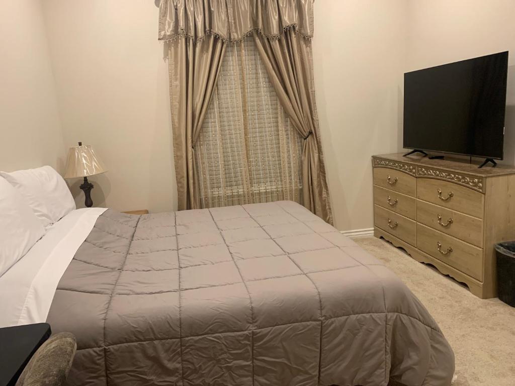 TV a/nebo společenská místnost v ubytování LuxHome Suites in Mansion