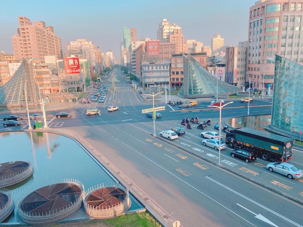 a view of a busy city street with cars at Centre Hotel in Kaohsiung