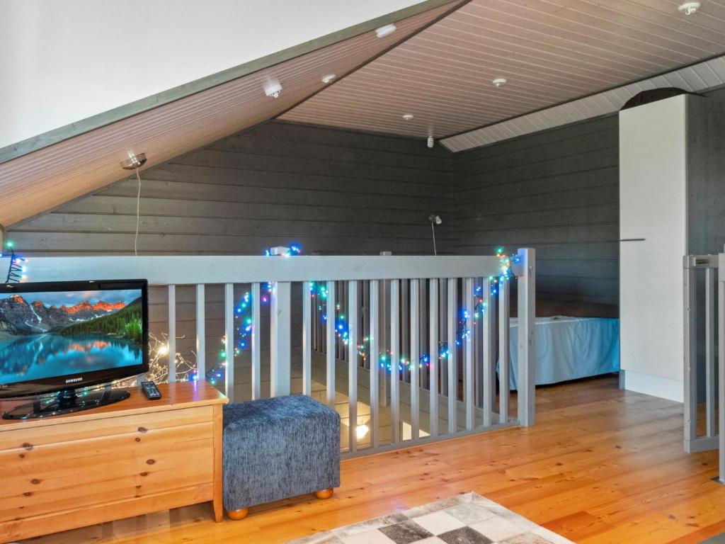 Телевизор и/или развлекательный центр в Holiday Home Kelkka 2 by Interhome